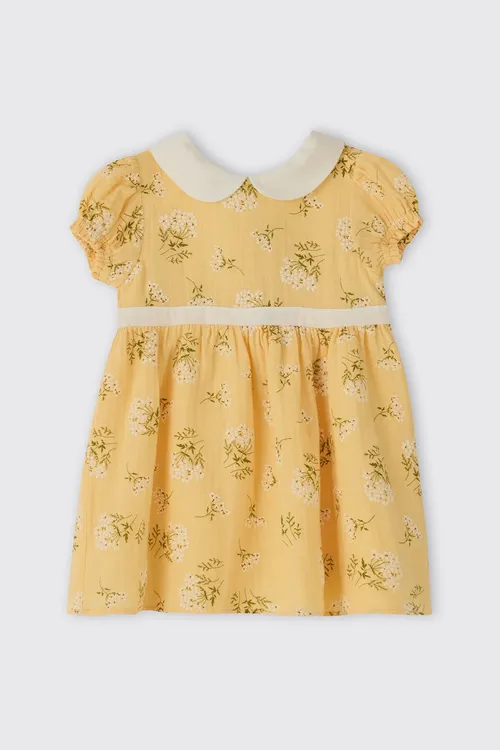 Gyz bäbekler üçin nagyşly sary muslin köýnek - 34134590