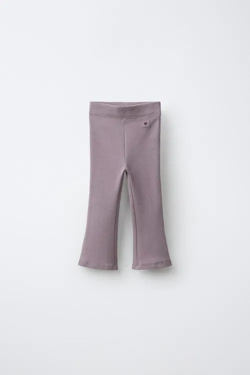 Aşagy giňelýän ýarlykly legins - 37227934