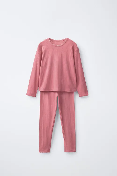 1 1/2-6 ýaş üçin tikin detallary bolan bir reňkli pijama - 36585963
